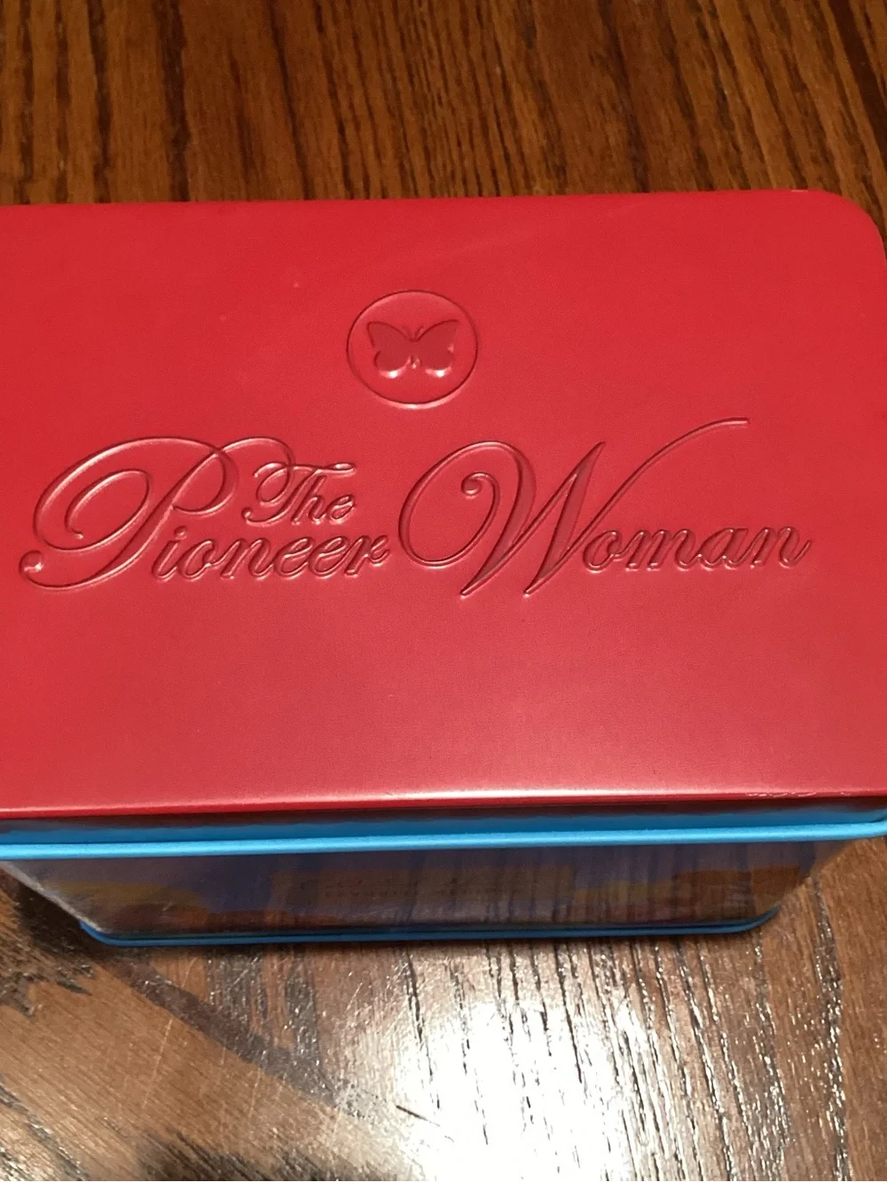 The Pioneer Woman Blue Tin with Red Lid and Floral Accents